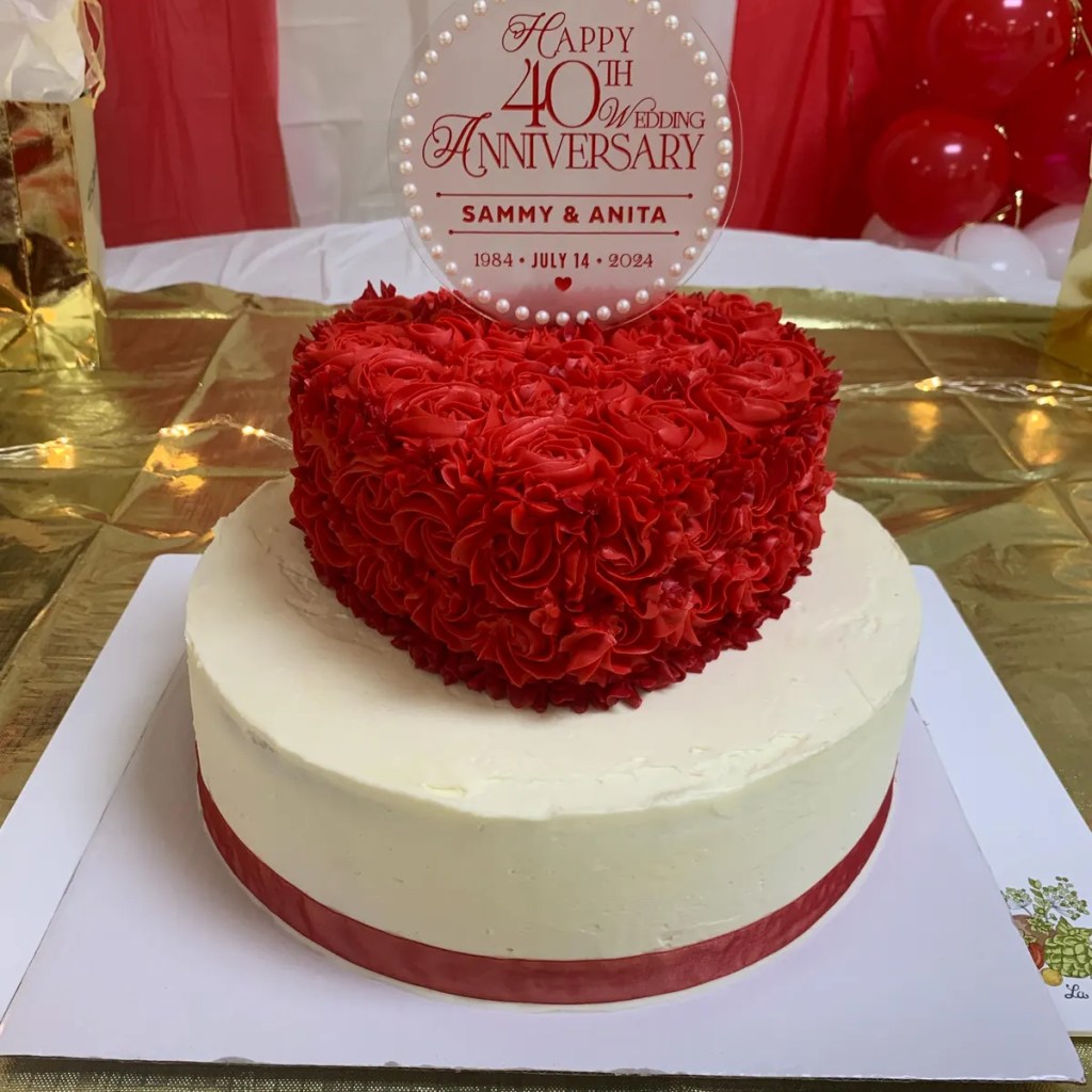 Customer images - Personalized anniversary cake toppers with a pearl border, custom names, and a snap-off stake for easy display